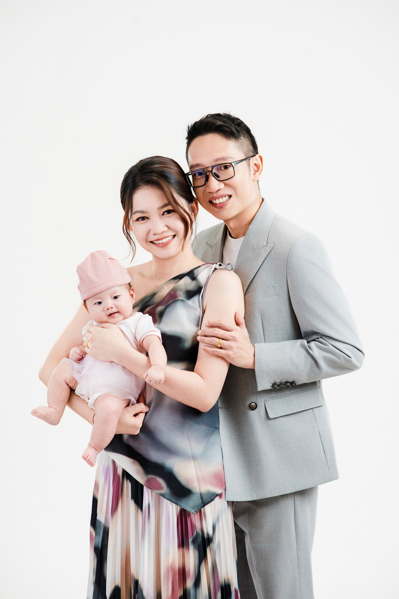 Patrick Tang and Winnie Leong with their baby